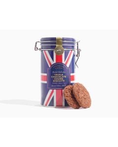 A Union Jack tin with metal clasp of Cartwright & Butler triple chocolate chunk biscuits with two chocolate biscuits against the tin on a white background 