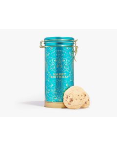 Blue happy birthday musical tin with gold clasp and gold designs on the tin with two biscuits leant against it 