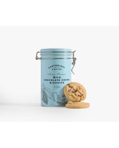 A light blue tin with a metal clasp of Cartwright & Butler milk chocolate chunk biscuits with illustration of leaves and a jug in grey, with two chocolate chunk biscuits leaning against the tin 