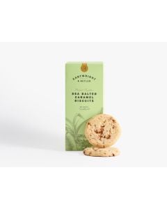 Light green box of Cartwright & Butler sea salted caramel biscuits with some illustrations in grey, with two biscuits leaning against the box 